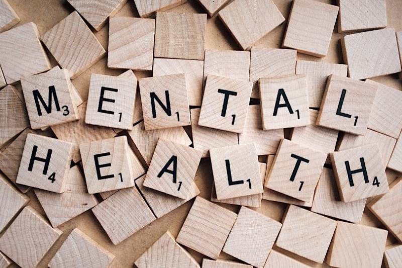 wooden, Scrabble-like chips spelling out 'Mental Health'